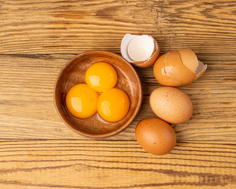 Egg Yolks in Bowl, Fresh Chicken Egg Yolk Separated from Whites